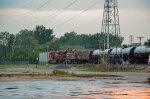 CP ES44AC Locomotives leading a train